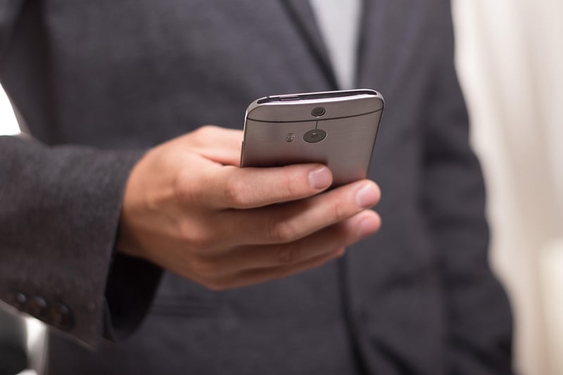 Business Woman on Smartphone